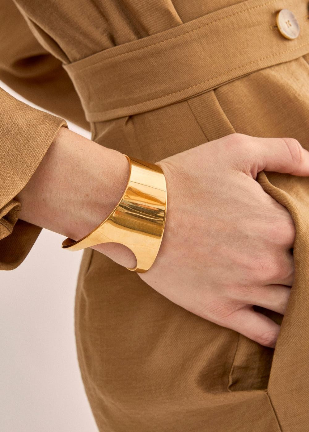 Bracciale Rigido Dorato Design Asimmetrico